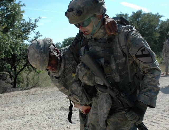 Pfc. Timothy Rollings (left), with A Company, 215th Brigade Support Battalion, 3rd Brigade Combat Team, 1st Cavalry Division from Desoto, Texas and Pvt. Jordan Sharp (right), from B Company, 3rd Battalion, 8th Cavalry Regiment from Eaton Rapids, Mich...