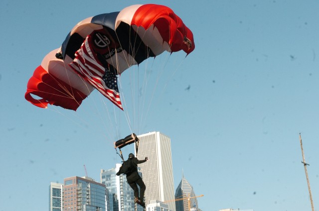 82d Airborne Division All American Freefall Team jump onto Navy Pier for Chicago&#039;s Kup&#039;s Purple Heart Cruise