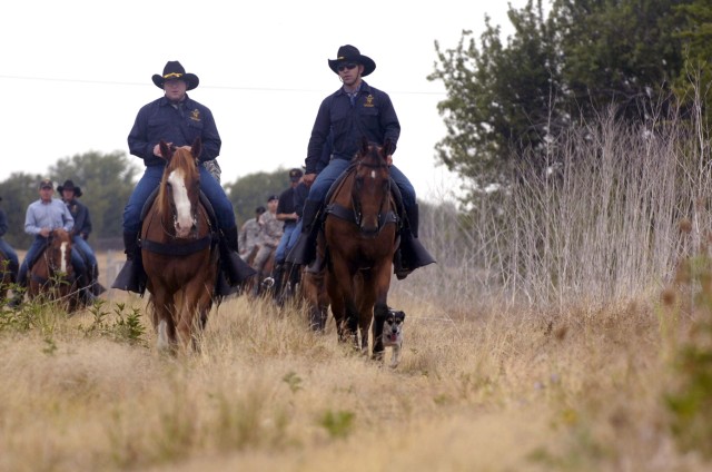 Soldiers from the Horse Cavalry Detachment, 1st Cavalry Division lead their riding party, consisting of Honolulu, Hawaii native Lt. Gen. Joseph F. Peterson (not pictured), deputy commanding general/chief of staff, U.S. Army Forces Command, and...