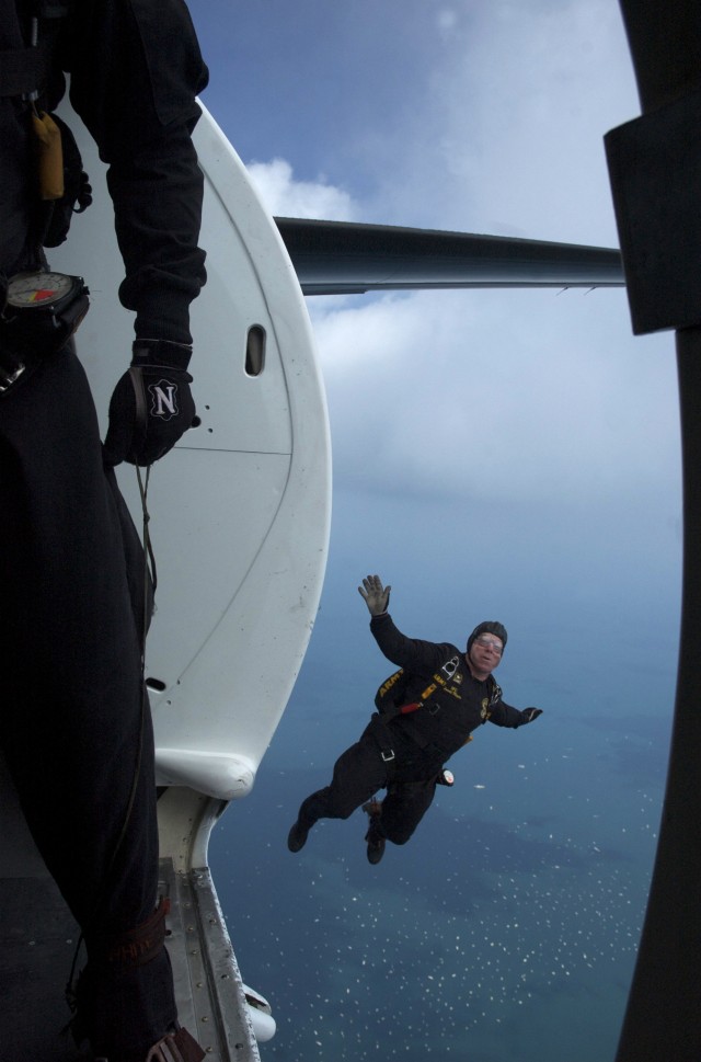 SFC Harold Meyers jumps during a Golden Knights demonstration for the 50th Chicago Air and Water Show