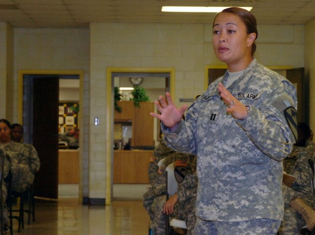 Puyallup, Wash. native, Capt. Olivia Nunn, commander of Headquarters and Headquarters Troop, 1st Brigade Combat Team, 1st Cavalry Division speaks to the female Soldiers attending the first Army Female Development Program about respect and...