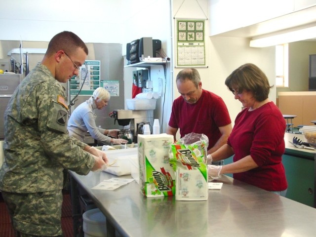 Deployed 5th Signal Soldier donates money, R&amp;R time to the needy