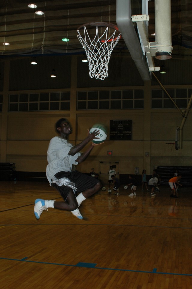 Rainbow jumpers: Youth hone basketball skills at UH-sponsored clinic