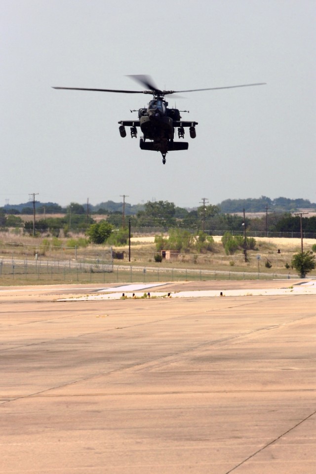 Although the AH-64D Apache helicopter's engines are loud as it comes in to land, onlookers could almost hear the glee and excitement coming from the Soldier sitting in the front seat. In this rare event, troopers of the 1st "Attack" Battalion,...
