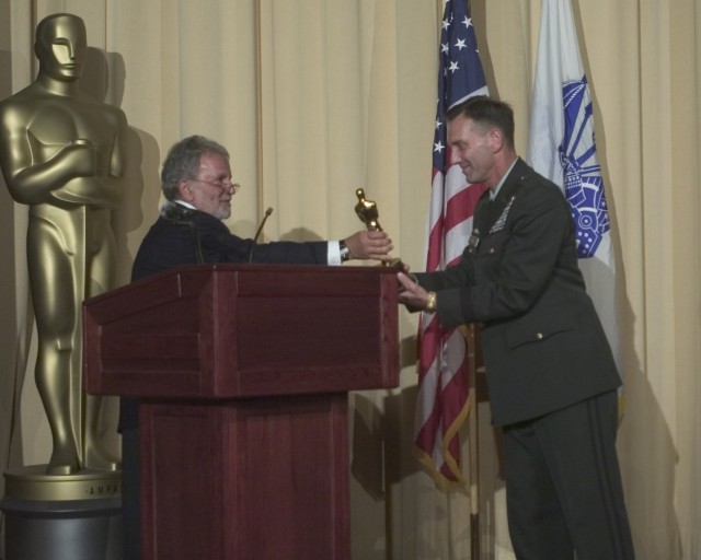 Brig. Gen. Jeffery E. Phillips accepts the Oscar