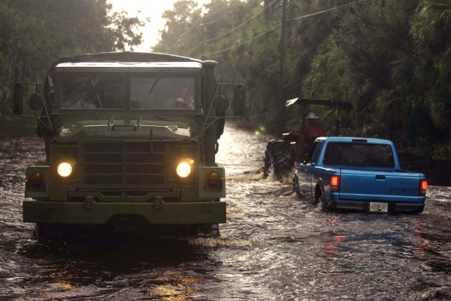 High-water vehicle plows Fay
