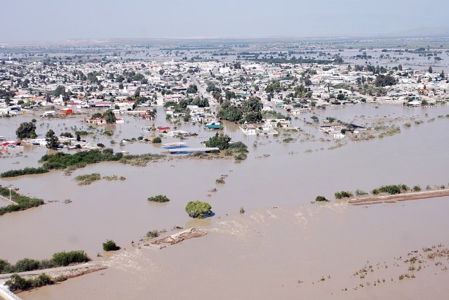 Towns in Mexico near the Rio Grande are under water due to flooding from the river. The CH-47F pilots and crewmembers from Company B "Black Cats," 2nd Battalion, 227th Aviation Regiment, 1st Air Cavalry Brigade, 1st Cavalry Division, are on a mission...