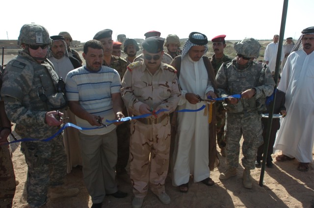 Abdul Razaq ribbon cutting