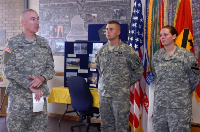 Maj. Gen. Daniel P. Bolger, commanding general, 1st Calvary Division praises Winfield, Kan. native Sgt. Nathan Hayes, 64th Military Police Company, 720th MP Battalion, 89th MP Brigade, and San Antonio native, Pfc. Ryann Gilmore, a nuclear,...