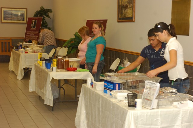 Local vendors display traditional Hispanic foods at the Hispanice American Heritage Observance event at Howze Theater on Fort Hood, Texas, Oct. 9. Soldiers sampled the vendors and left a ticket with their favorite, and the winner was announced at the...