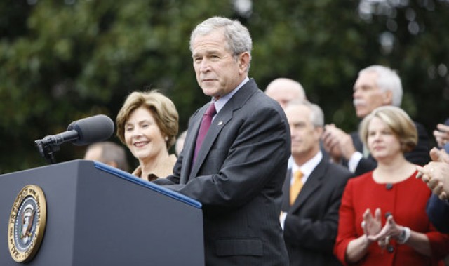 President George W. Bush, addressing members of his Cabinet, on the South Lawn of the White House Thursday