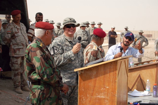 Lt. Col. Mark Simerly, 27th BSB commander, speaks prior to a soccer match between his unit and Soldiers of MTR, 10th IA Div. at COB Adder in southern Iraq Oct. 23. The contest was an effort to further strengthen the two units' partnership in...