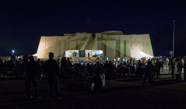 The Ziggurat of Ur stands as a historical backdrop to the Mud House performance held on Contingency Operating Base Adder Nov. 9. Iraqi children, many from Nasiriyah, and hundreds of citizens were seated on carpets and metal bleachers during the...