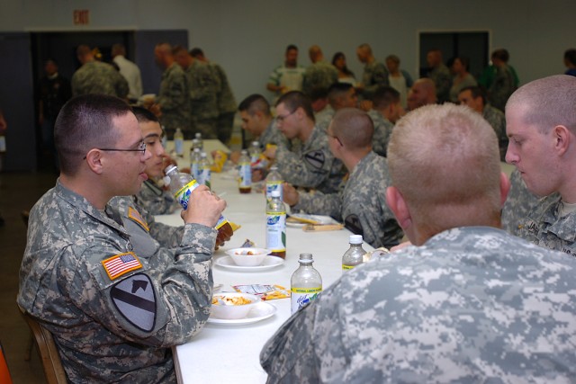 After marching down the streets of Waco, Texas, during their annual Veteran's Day Parade, Soldiers of the 615th "Cold Steel" Aviation Support Battalion, 1st Air Cavalry Brigade, 1st Cavalry Division, were treated to some food at the Veteran's of Fore...