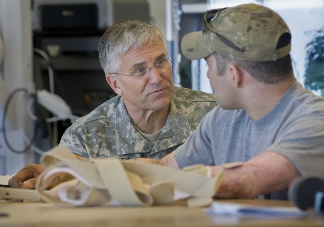 Spc. Jamin Moore and Gen. George Casey