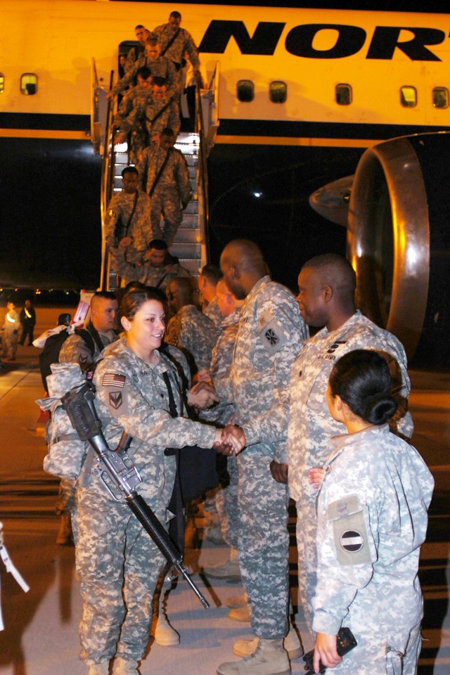 Members of the 377th Transportation Company, a part of the Fort Hood-based 180th Transportation Battalion, 15th Sustainment Brigade, are greeted by members of their leadership as they deplane at Fort Bliss' Biggs Army Airfield Nov. 14. The Soldiers h...