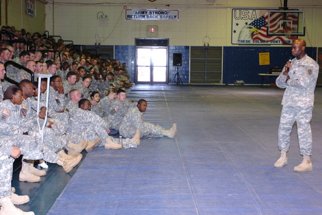 Command Sgt. Maj. Nathaniel Bartee Sr., the senior noncommissioned officer for the 15th Sustainment Brigade, 13th Sustainment Command (Expeditionary), talks to the brigade's sergeants and junior enlisted Soldiers at the Kieschnick Physical Fitness...