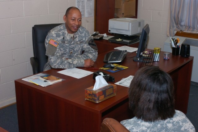 Chaplain Joshua Pair sits in his office at 2nd Brigade Combat Team, 1st Cavalry Division chapel at Fort Hood, Texas on Dec. 11. The chaplain performs many services to the Soldiers of the 2nd BCT including ministering, leading luncheons and...
