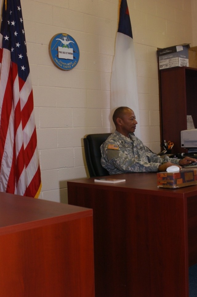 BodyChaplain Joshua Pair sits in his office at 2nd Brigade Combat Team, 1st Cavalry Division chapel at Fort Hood, Texas on Dec. 11. The chaplain performs many services to the Soldiers of the 2nd BCT including ministering, leading luncheons and...