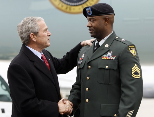 Soldier receives award from President Bush