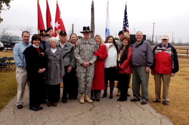 Members and friends of the Murray family stand proudly after the promotion of Brigadier General John (Mike) Murray, Dec. 23 at the 1st Cavalry Division Stables. From left to right:  Matt Murray (brother), Cindy Murray (sister), Cadet Jayna Murray (da...
