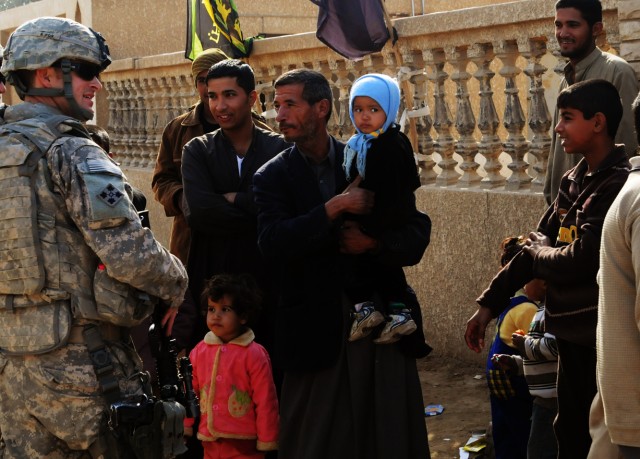 Iraqi, U.S. Soldiers conduct reconnaissance patrol in Hamza