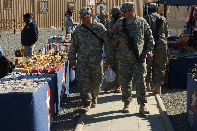 Soldiers from 2nd Brigade Combat Team, 1st Cavalry Division, take a look at the bazaar set up outside the Camp Buehring, Kuwait Post Exchange. 2nd BCT Soldiers will spend a few weeks in Kuwait participating in training and briefings that will...