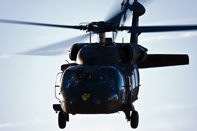 A UH-60 Black Hawk from the 3rd Assault Helicopter Battalion, 227th Aviation Regiment, 1st Air Cavalry Brigade, 1st Cavalry Division, departs Robert Gray Army Airfield, Fort Hood, Texas, Jan. 8. "Spearhead" will be supporting 1st Attack...