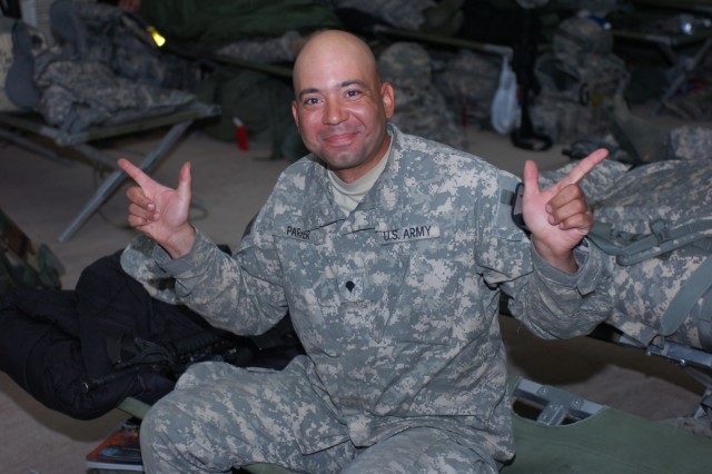 Kissimmee, Fla. native Spc. Frank Parker, a motor transport operator for Troop D, 4th Squadron, 9th Cavalry Regiment, 2nd Brigade Combat Team, 1st Cavalry Division, strikes a pose while at Camp Buehring, Kuwait. Although Parker took a nearly 15 year ...