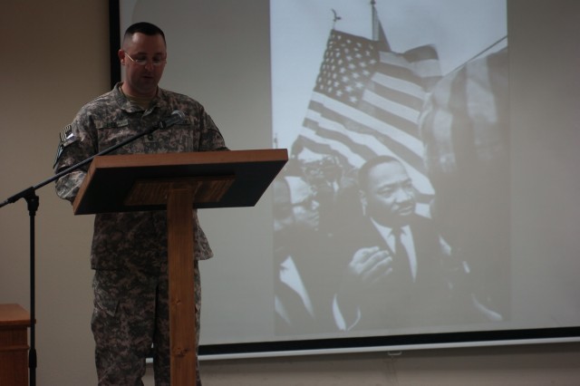 Staten Island, N.Y. native Sgt. Michelle Brown, the 2nd Brigade Combat Team, 1st Cavalry Division commander's assistant, reads part of a speech given by Dr. Martin Luther King Jr. She took part in the emotionally charged MLK day celebration that...