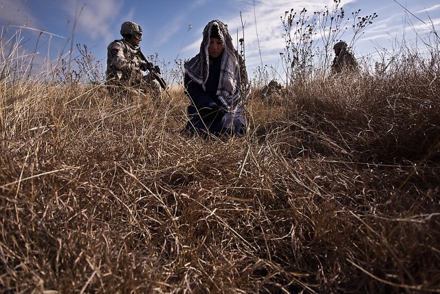 Playing the role of an Iraqi local national, Baltimore native, Pfc. Margret Henrie, a communications specialist for Headquarters and Headquarters Company, 3rd Assault Helicopter Battalion, 227th Aviation Regiment, 1st Air Cavalry Brigade, 1st...