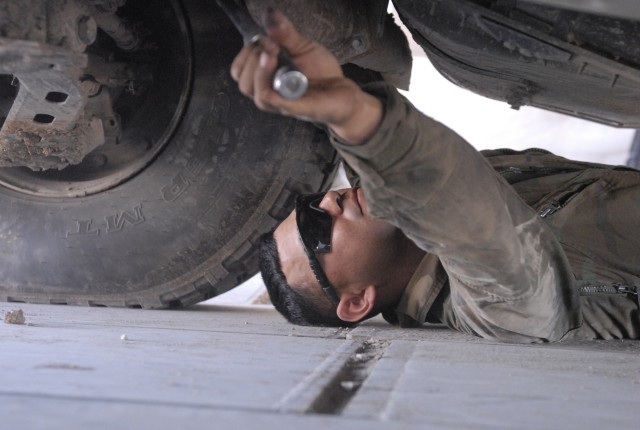 Spc. Ramijio Gonzales, an all-wheel mechanic from Corpus Christi, Texas, in the 2nd Battalion, 12th Cavalry Regiment, 4th Brigade Combat Team, 1st Cavalry Division, conducts a Preventive Maintenance Checks and Service (PMCS) on a tactical vehicle bef...