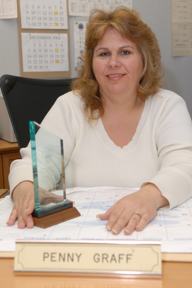 DDTP employee claims award with determination, hard work