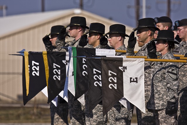 On the cold morning of Jan. 28, at Fort Hood, Texas, leadership of the 4th Attack Reconnaissance Battalion, 227th Aviation Regiment, 1st Air Cavalry Brigade, 1st Cavalry Division, render honors to the national anthem during a building dedication...