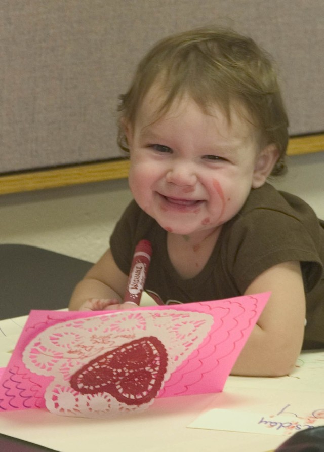 Keiki create Valentines for deployed parents at the Sgt. Yano Library