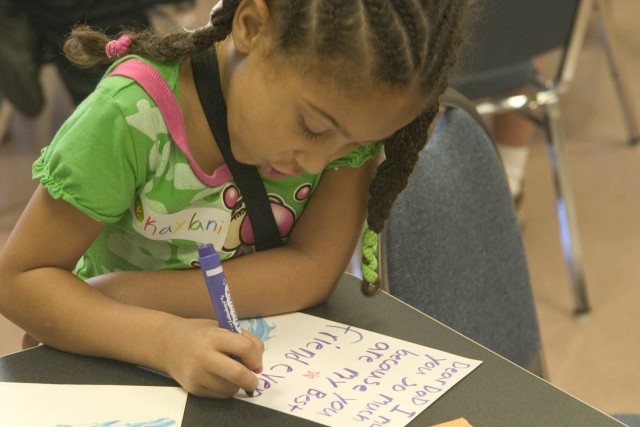 Keiki create Valentines for deployed parents at the Sgt. Yano Library