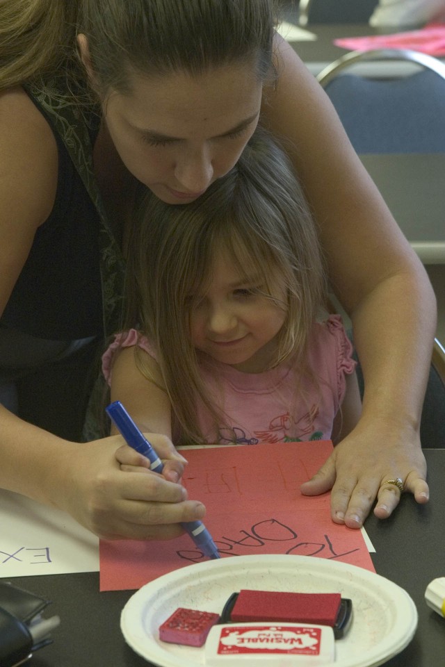 Keiki create Valentines for deployed parents at the Sgt. Yano Library