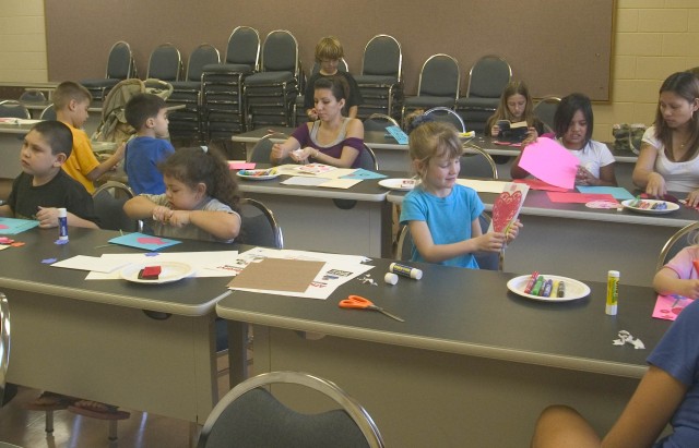 Keiki create Valentines for deployed parents at the Sgt. Yano Library