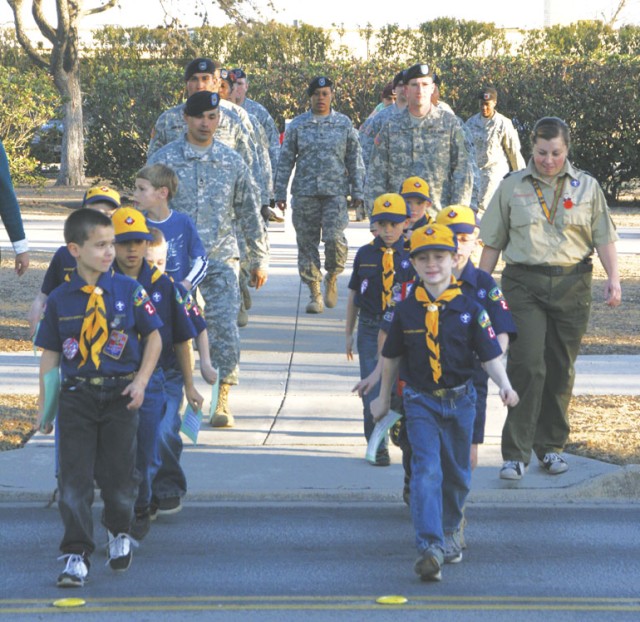 Cub Scouts of Pack 23, Den 7 march to retreat