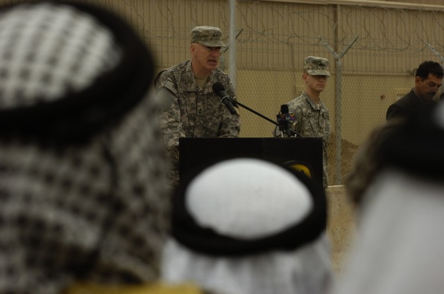 CAMP LIBERTY, Iraq - Maj. Gen. Daniel Bolger, commanding general of 1st Cavalry Division, Multi-National Division - Baghdad, addresses the audience as local Iraqi Sheiks listen during the transfer of authority ceremony at Camp Liberty in Baghdad...