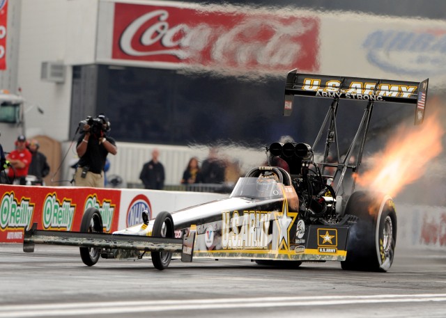 Schumacher wins first pass in Pomona