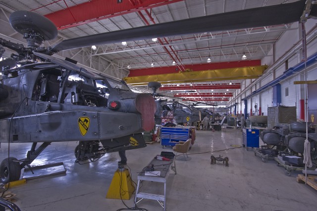 The AH-64D Apache helicopters of 4th Attack Reconnaissance Battalion, 227th Aviation Regiment, 1st Air Cavalry Brigade, 1st Cavalry Division, fill the hanger, along with tools and aircraft components, as they were being put through an extensive modif...