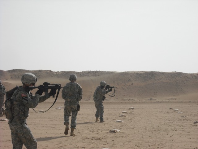 Soldiers from HHT and Troop B, 1st Bn., 7th Cav. Regt., 1st BCT, 1st Cav. Div., engage targets Feb. 8, during Close Quarters Marksmanship Training at Udari Range in Kuwait. The training focused on engaging the enemy during dismounted patrols and...