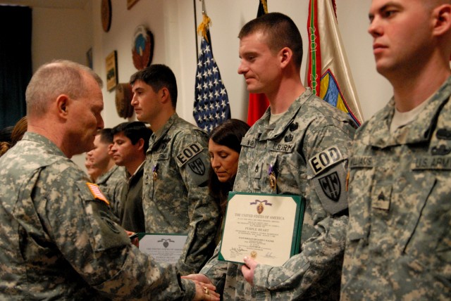SSG Benjamin Wagner awarded Purple Heart by MG Yves Fontaine