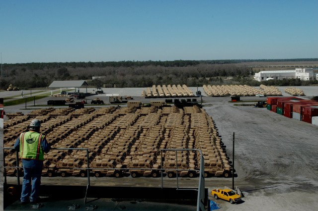 MRAPs in staging yard