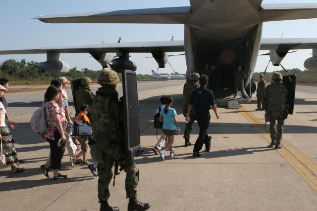 Militaries from four nations work together during evacuation exercise