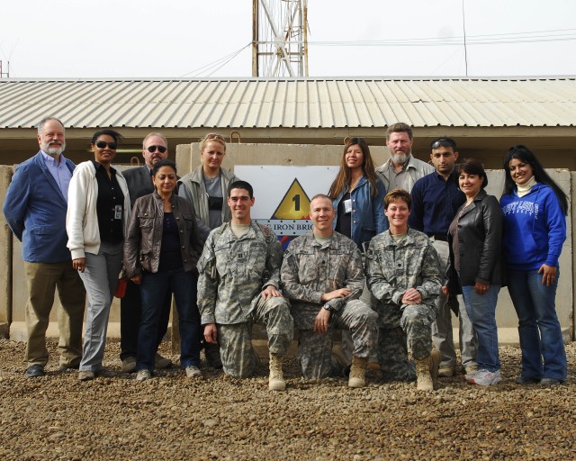 BAGHDAD - Members of the Embedded Provincial Reconstruction Teams Health and Women's Initiatives group from 2nd Brigade Combat Team, 1st Armored Division, Multi-National Division-Baghdad, met at Camp Striker, Iraqi Feb. 15 to discuss and support the ...