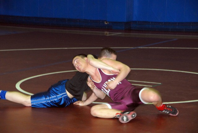 Soldiers wrestle in valentine's Day smackdown