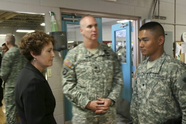 Mrs. Allgood talks with award winner Spc. Pilar