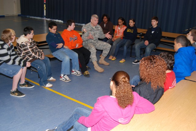 U.S. Army Europe commanding general visits middle school students to discuss their concerns about Army life 